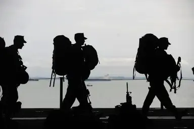 Veterans walking in a line