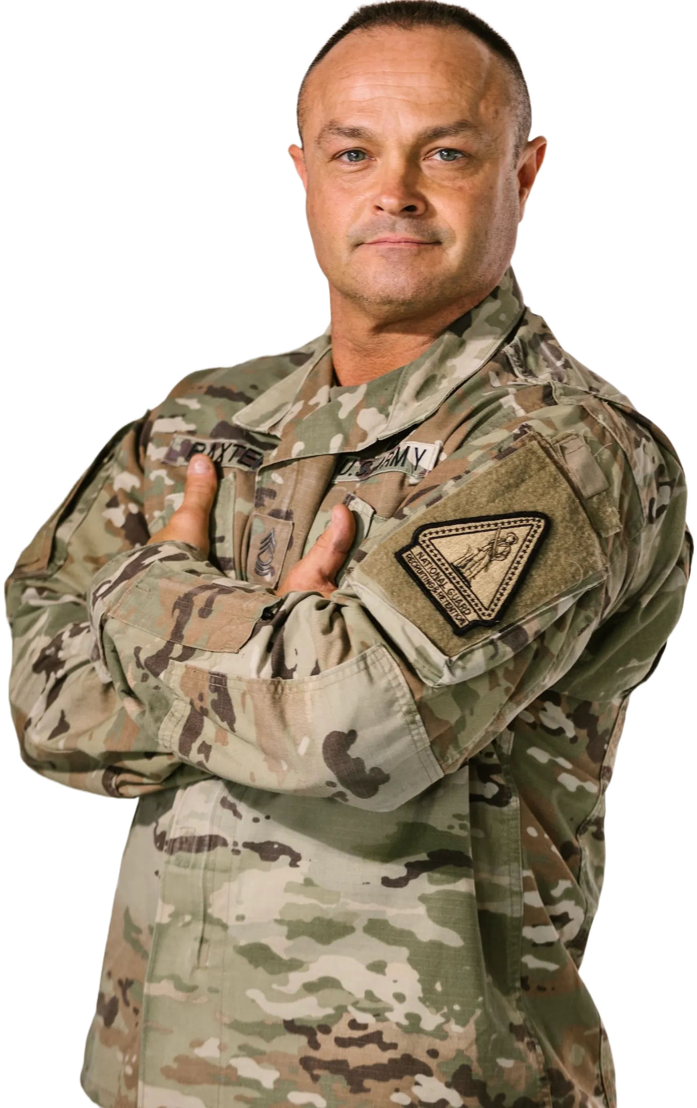 Picture of a smiling veteran with arms crossed over his chest.