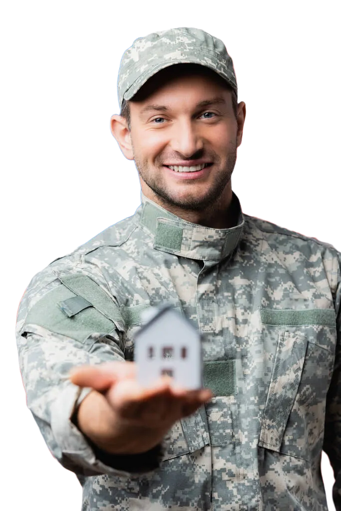 Picture of a smiling veteran with tiny house in the palm of his hand.